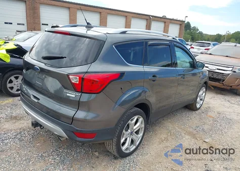 2019 Ford Escape Titanium z USA, uszkodzony, nr VIN 1FMCU0J99KUC17133